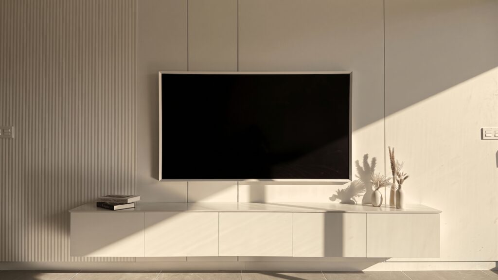 Completed bespoke TV wall with integrated storage