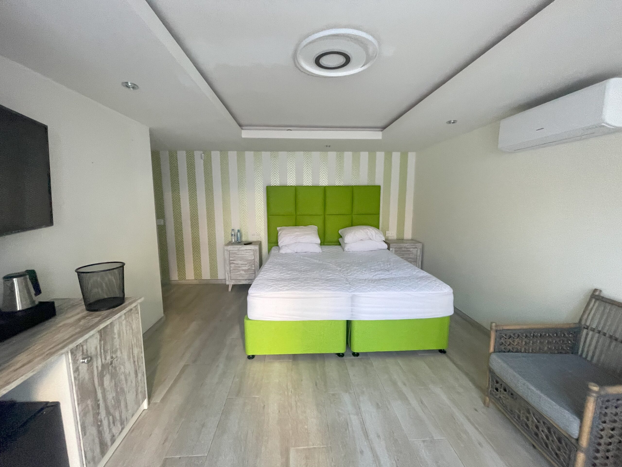 Existing boutique hotel guest room before the interior design renovation