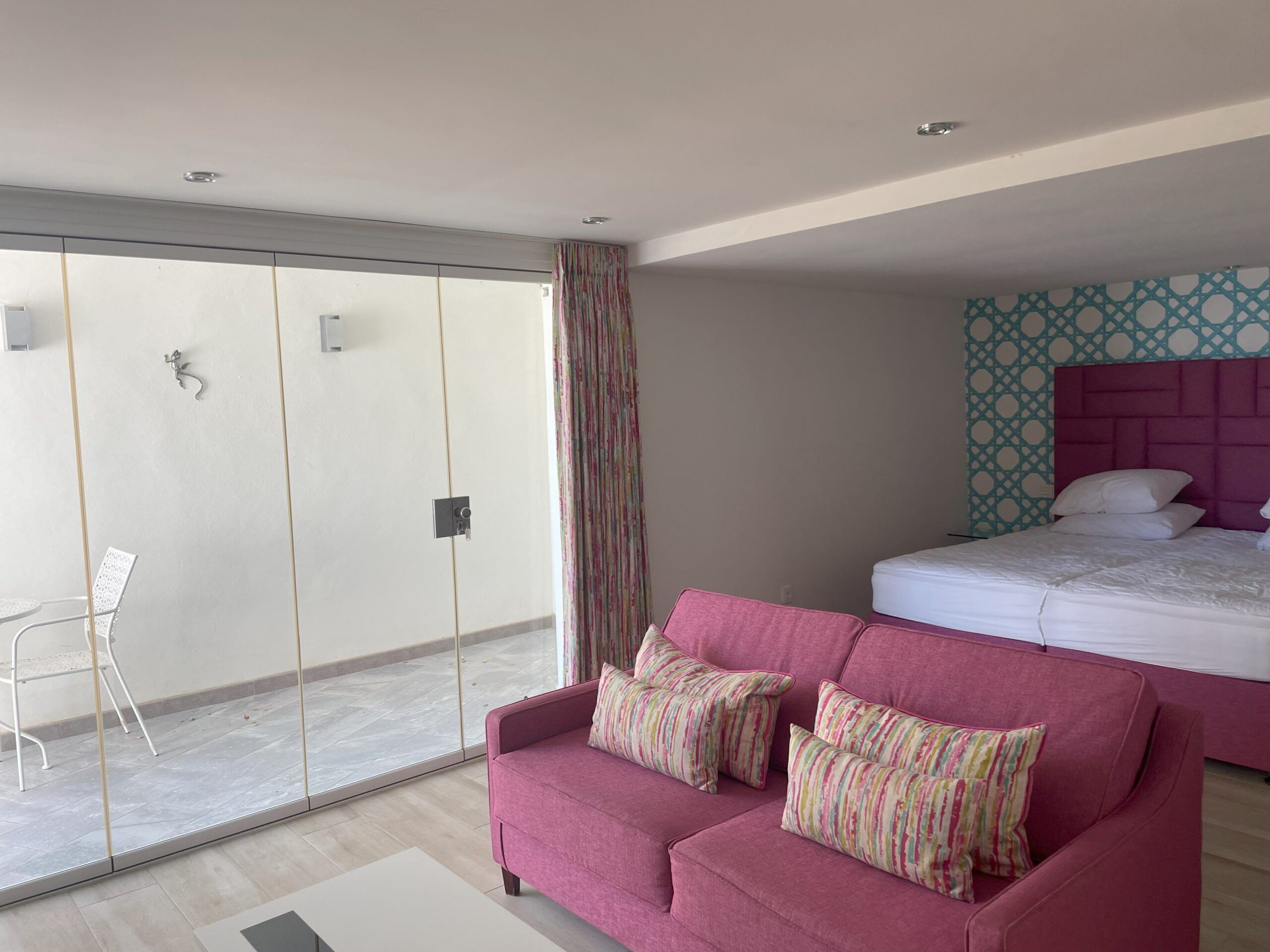 Existing boutique hotel suite before renovation and bespoke furniture design