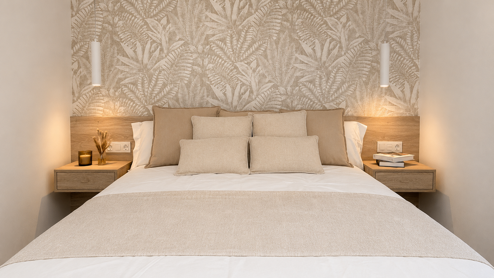 Neutral bedroom with an upholstered headboard in Manilva