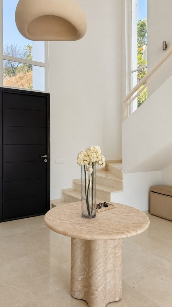 After: completed warm contemporary living room at Golden Hour Residence.