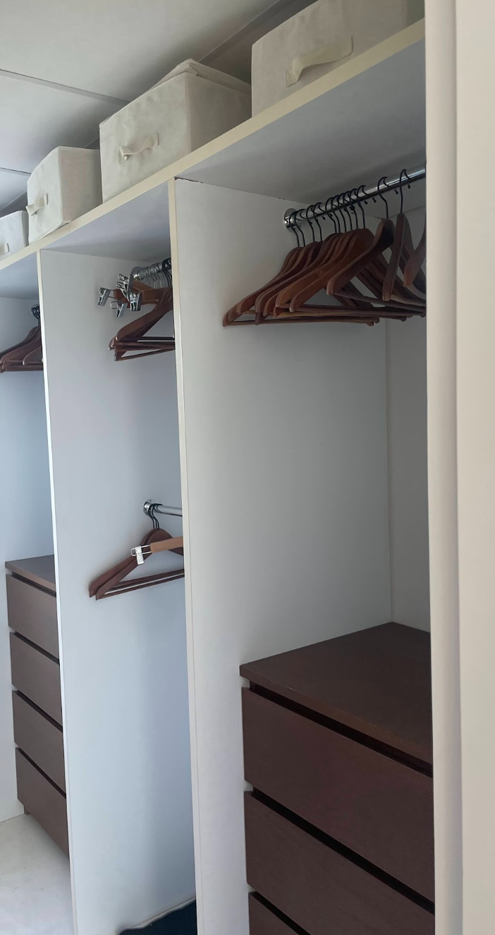 Before: original walk-in wardrobe before the bespoke redesign in Mijas.