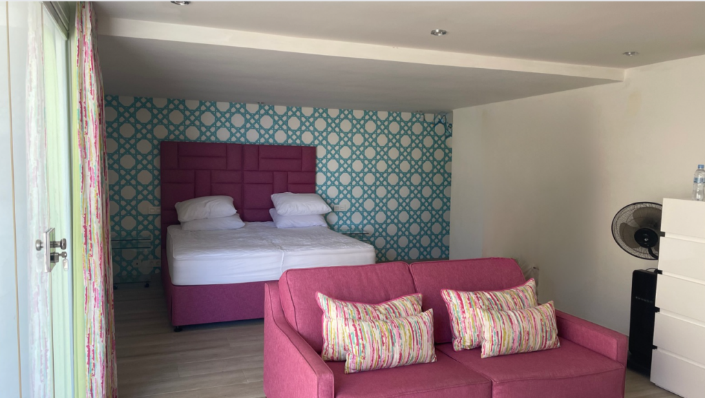 Before: existing Marbella interior with a fragmented visual identity.